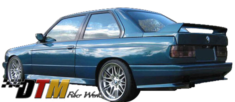 DTM Fiber Werkz BMW E30 M3 Evo Style Rear Bumper View 1 DTM Fiber Werkz BMW E30 M3 Evo Style Rear Bumper View 1