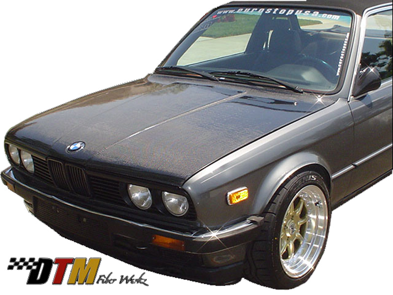 DTM Fiber Werkz OEM Style Hood in CFRP View 1 DTM Fiber Werkz OEM Style Hood in CFRP View 1