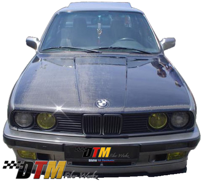 DTM Fiber Werkz OEM Style Hood in CFRP View 5 DTM Fiber Werkz OEM Style Hood in CFRP View 5
